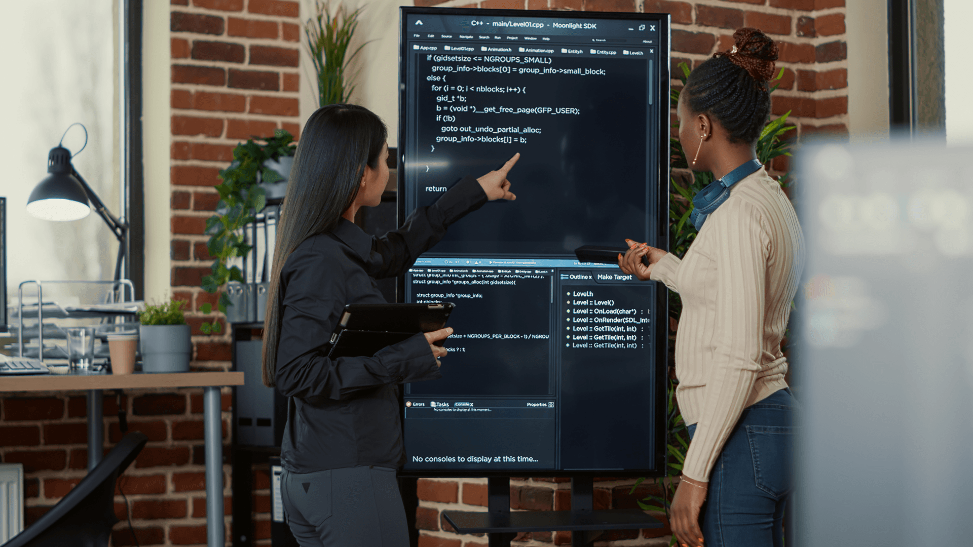 Two developers reviewing code together